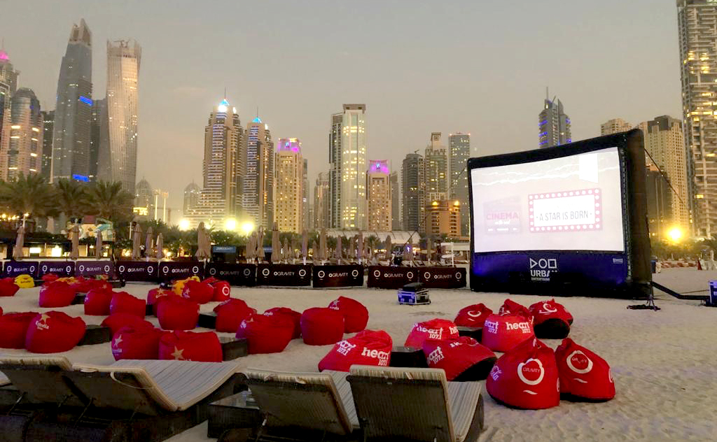Discover the magic of outdoor cinema at the stunning waterfront Promenade at Manar Mall